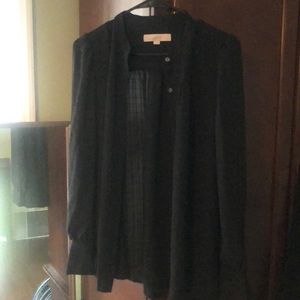 Black button up shirt. Never worn.